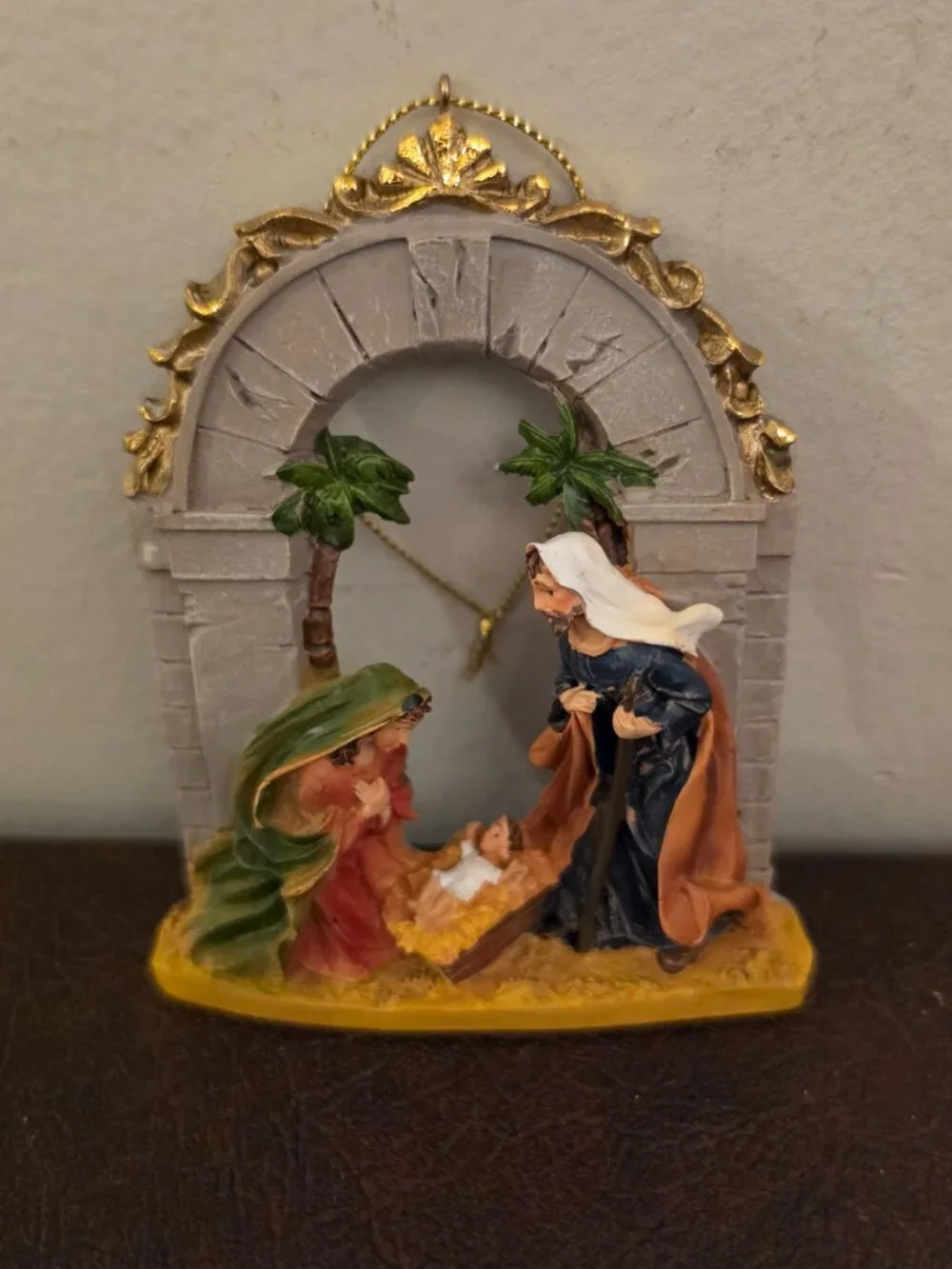 Vintage Nativity Scene Tree Ornament is a small, multicolor plastic ornament